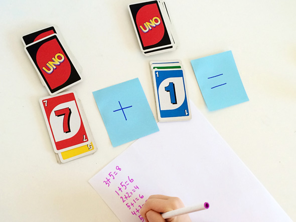 Math games for kids: Uno flip for number sentences