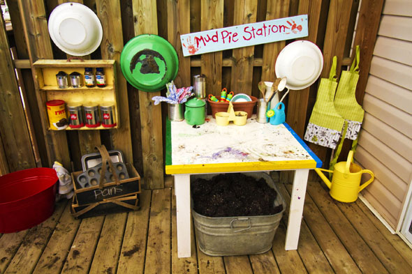 setting up a mudpie kitchen play space