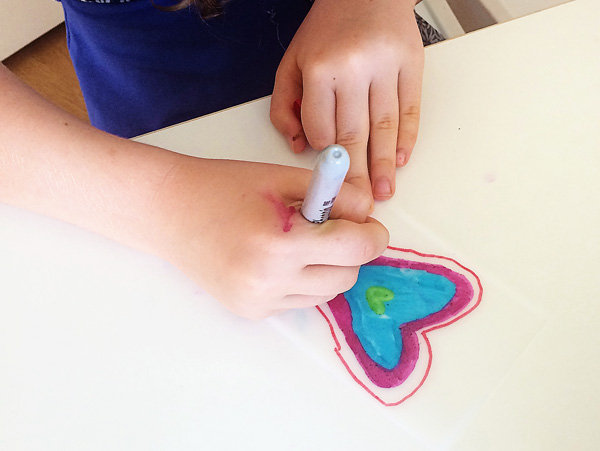 Hanging hearts drawing and threading activity for kids