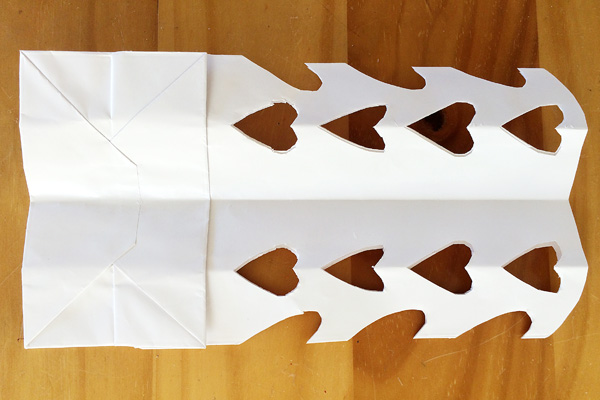 Giant Paper Bag Snowflakes Tutorial. Such a fun Christmas craft!