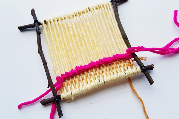 Weaving on a twig frame tutorial step 11