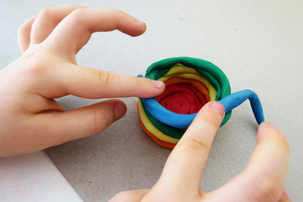 Plasticine pots activity for the sense of touch